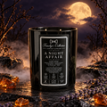 A Night Affair candle in a moonlit Halloween scene