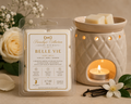 Belle Vie 2.7 oz wax melts beside a wax warmer