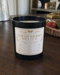 Strawberry Délice 8 oz candle in black tumbler with white and gold horizontal label