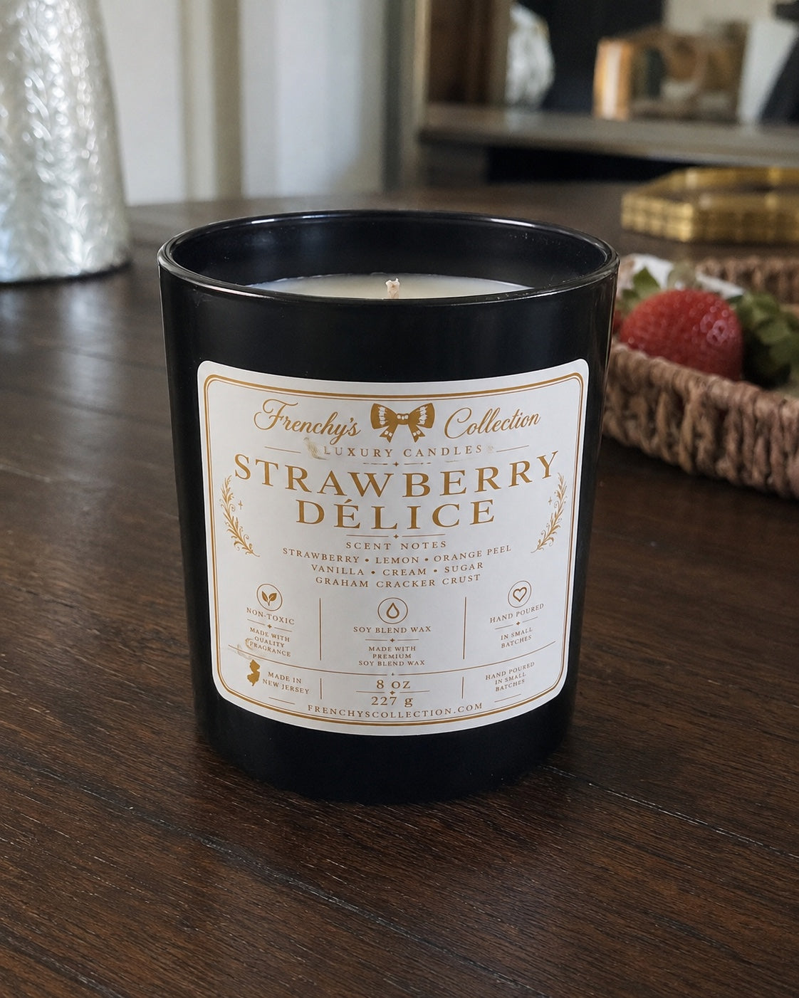 Strawberry Délice 8 oz candle in black tumbler with white and gold horizontal label